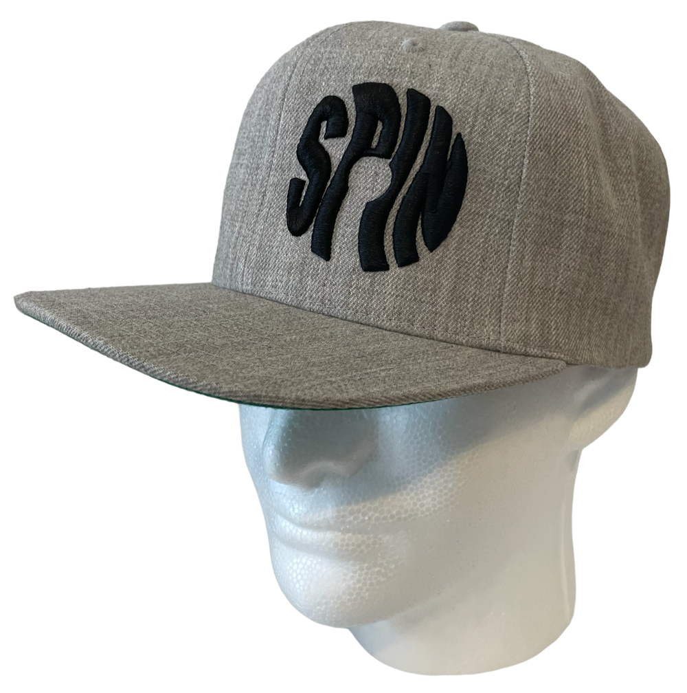 Eco-Friendly SPIN Cap Made From Recycled Plastic Bottles.